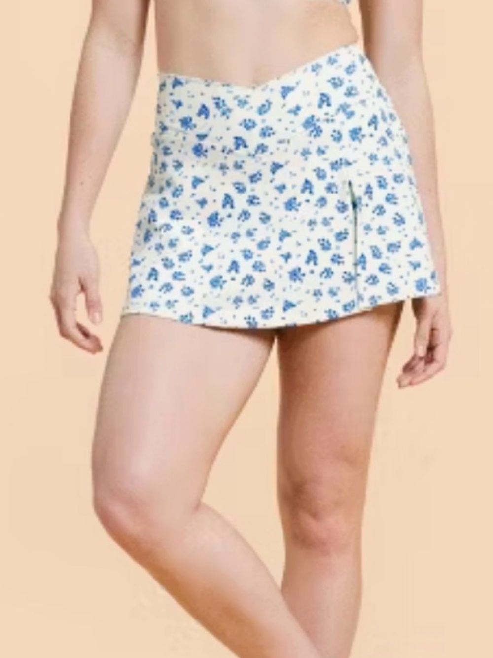 Blogilates Crisscross Slit Skort NWT size Small Blue and Cream Floral Pockets